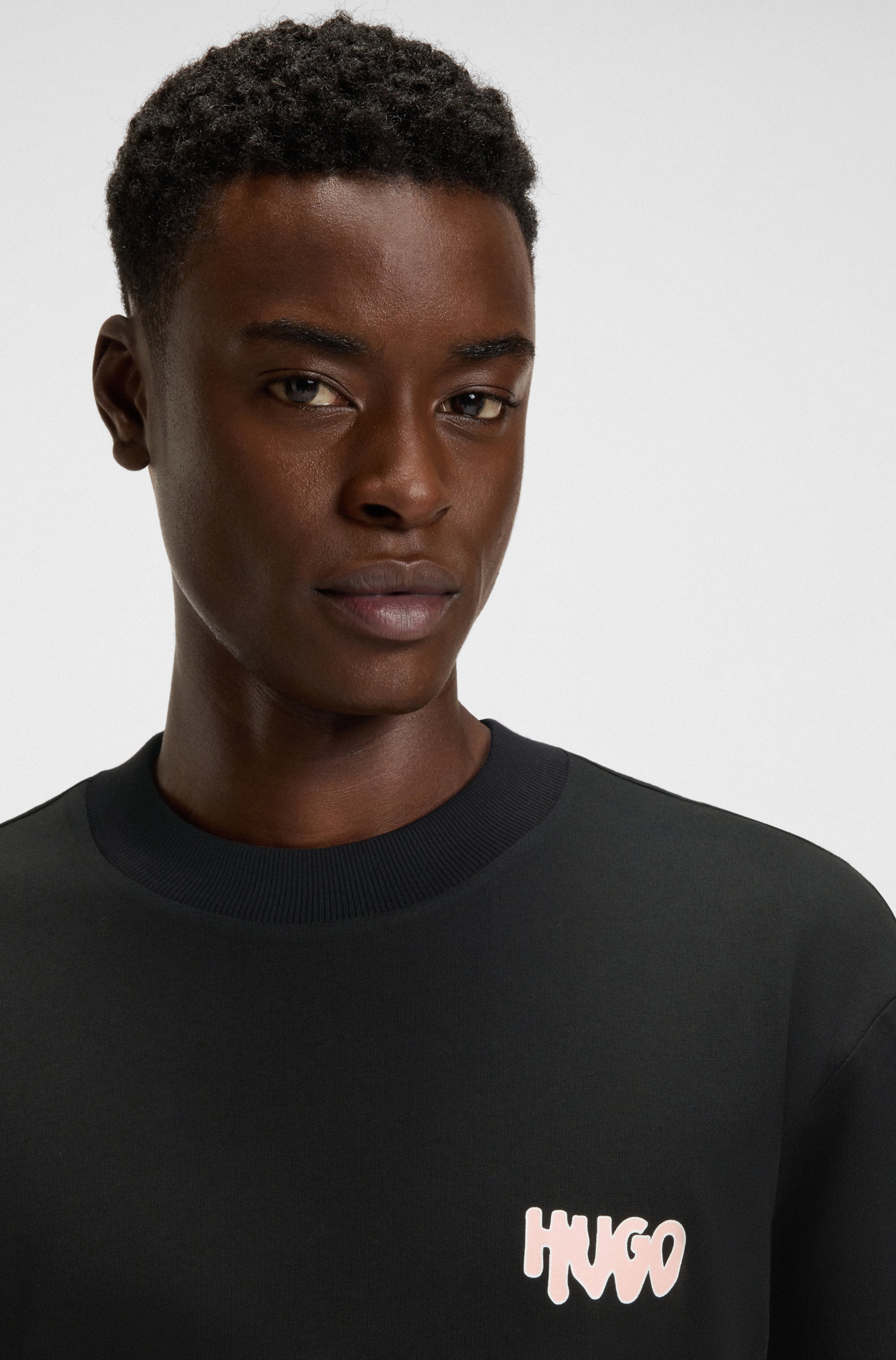 Cotton-jersey T-shirt with rear logo artwork