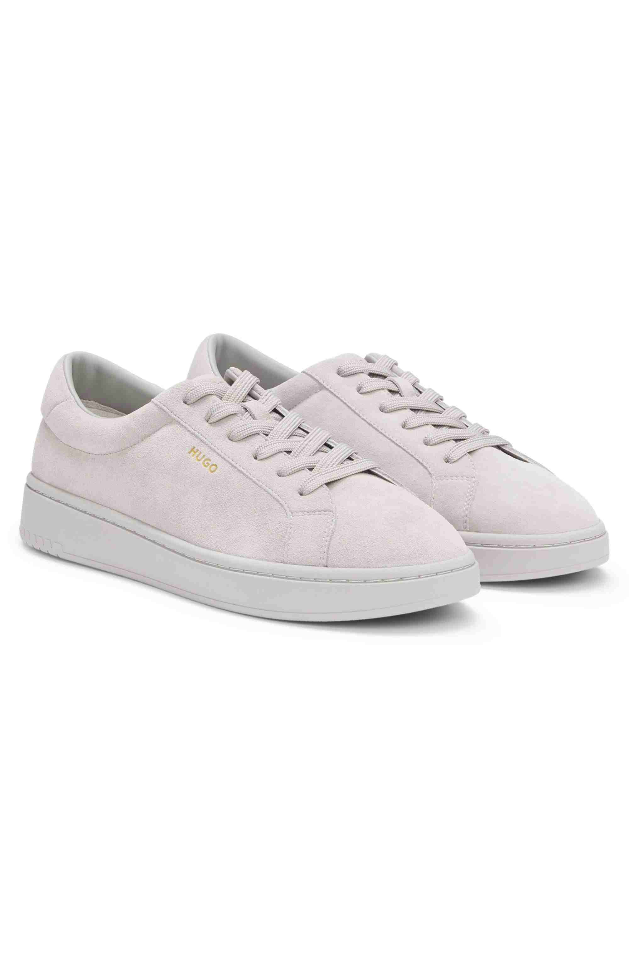 Suede trainers with gold-tone foil logo