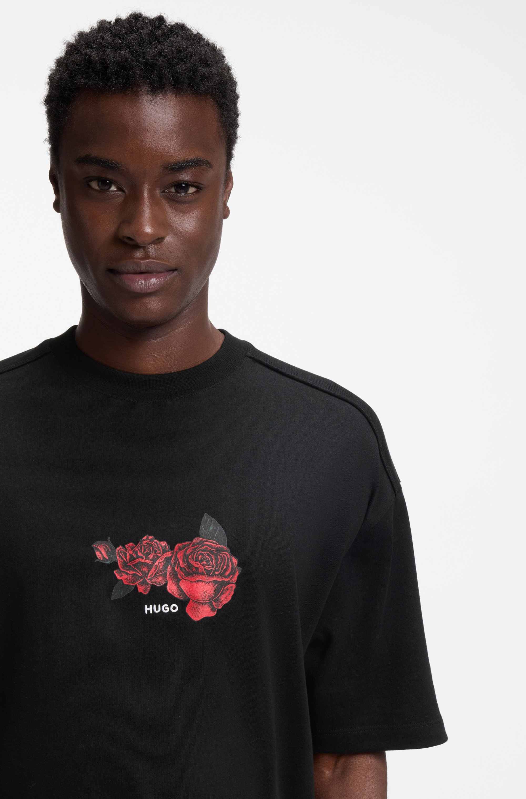 Oversized-fit cotton T-shirt with biker and roses graphic