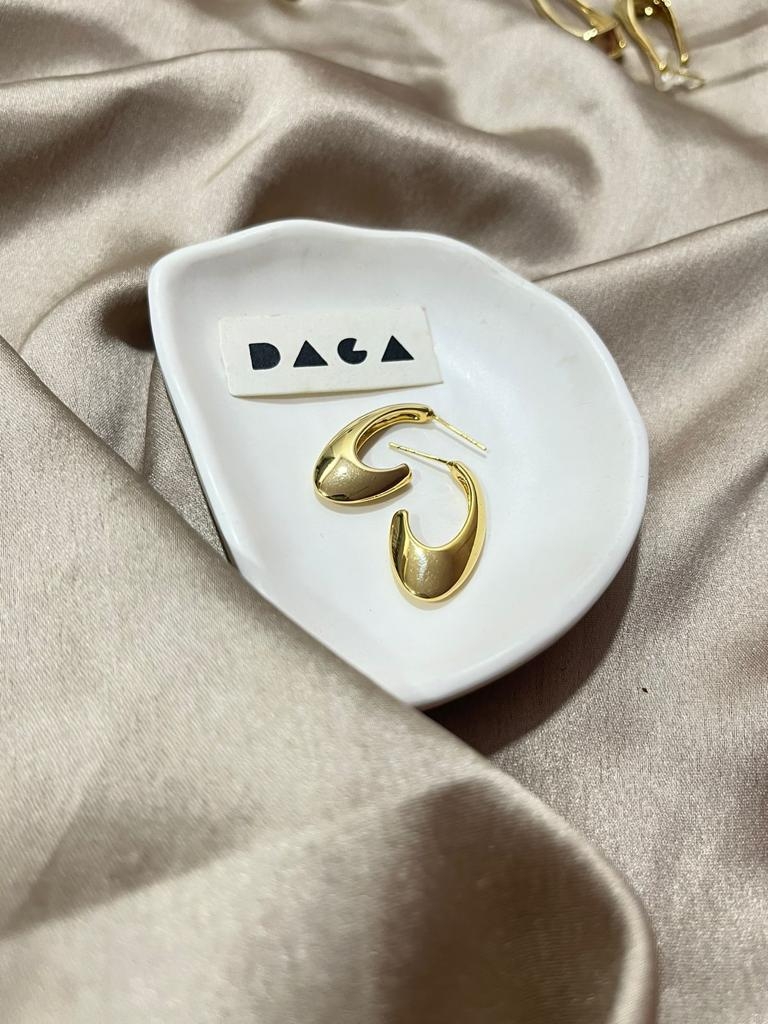 DAGA | gold half ovaled earrings undefined