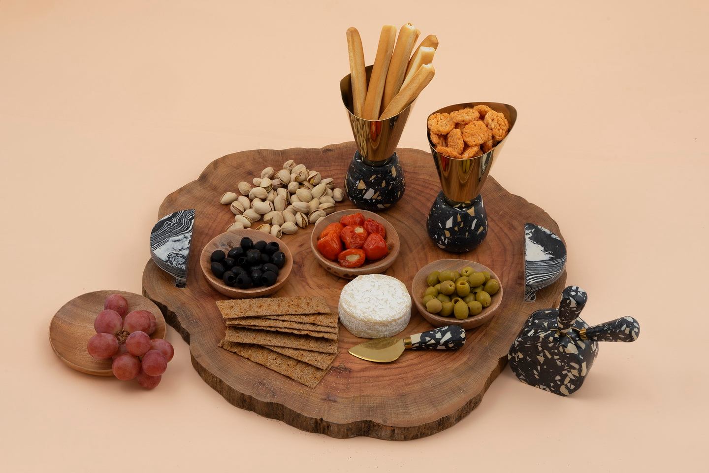 Charcuterie board with black terrazzo handles