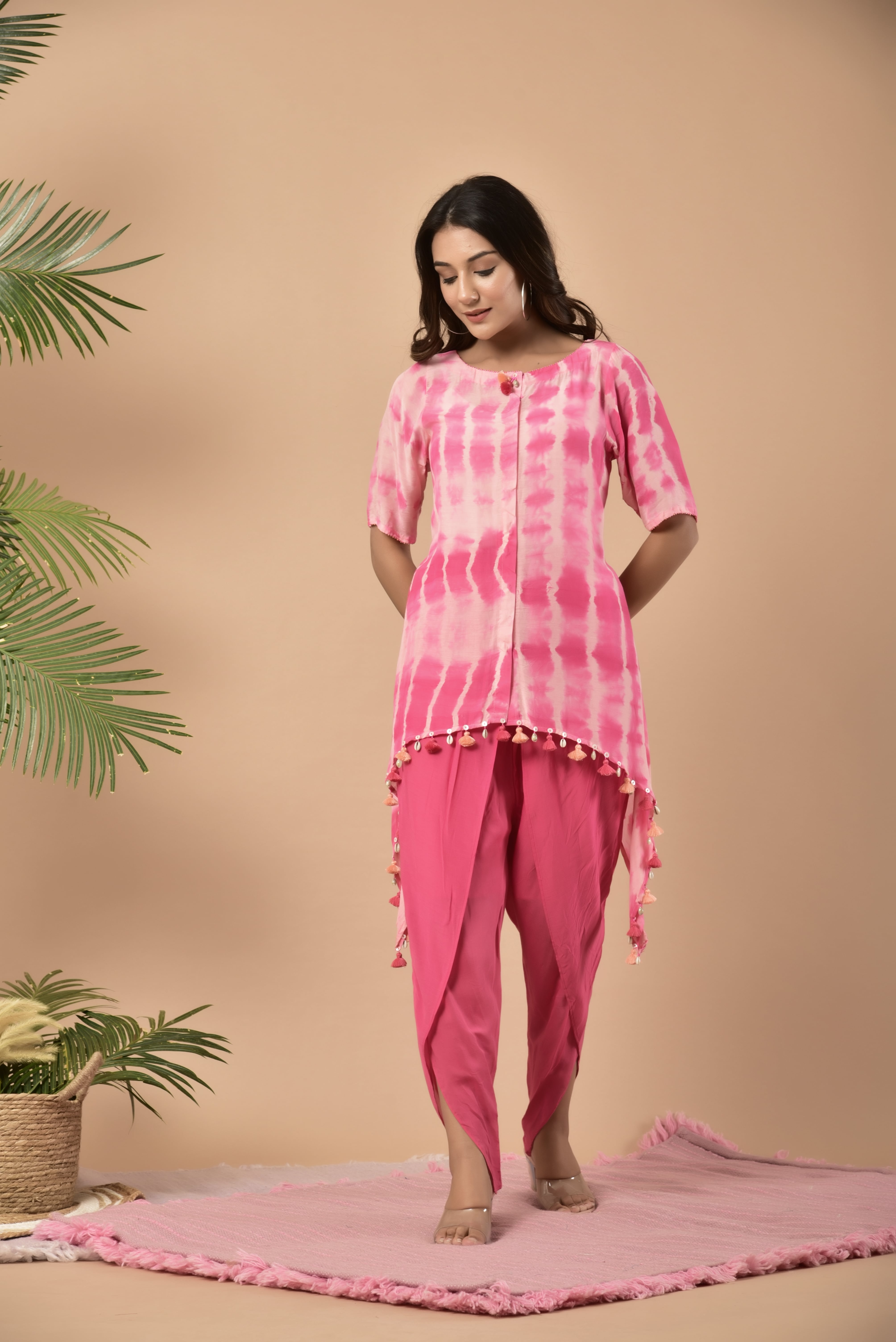 KAARAH BY KAAVYA | Pink shibori a - symmetrical top paired with dhotti pants undefined