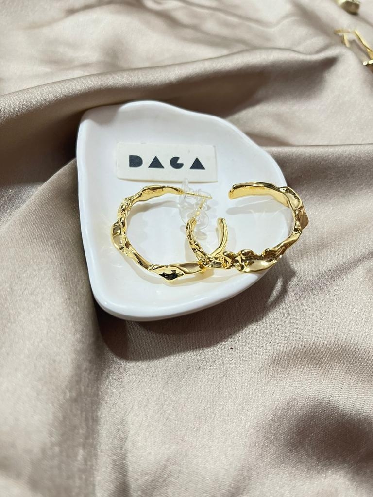 DAGA | gold crooked round hoops undefined