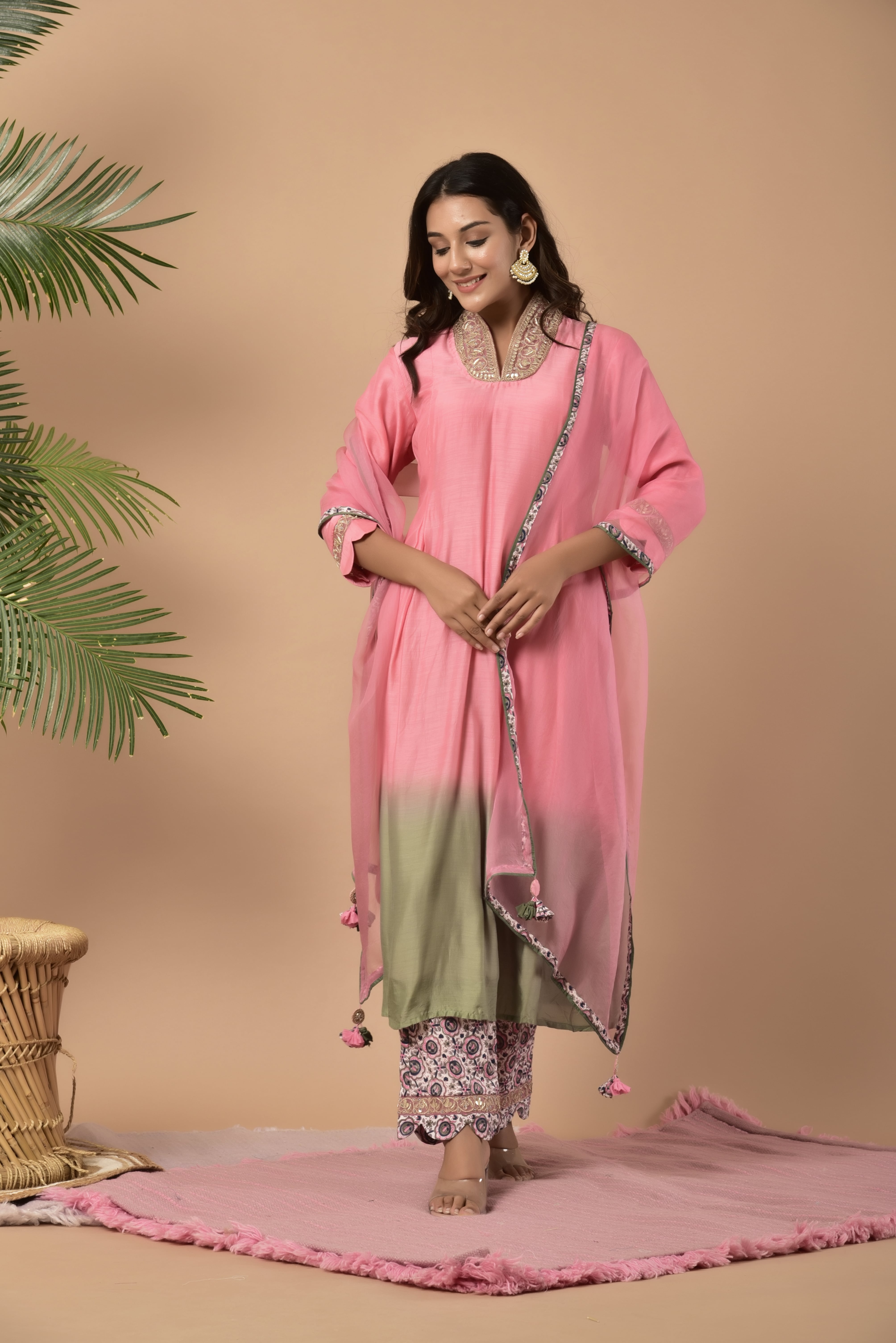 Shaded summer silk kurta with gota work on collar and sleeves and it comes with printed pant with scallop and orgenza dupatta with tassel