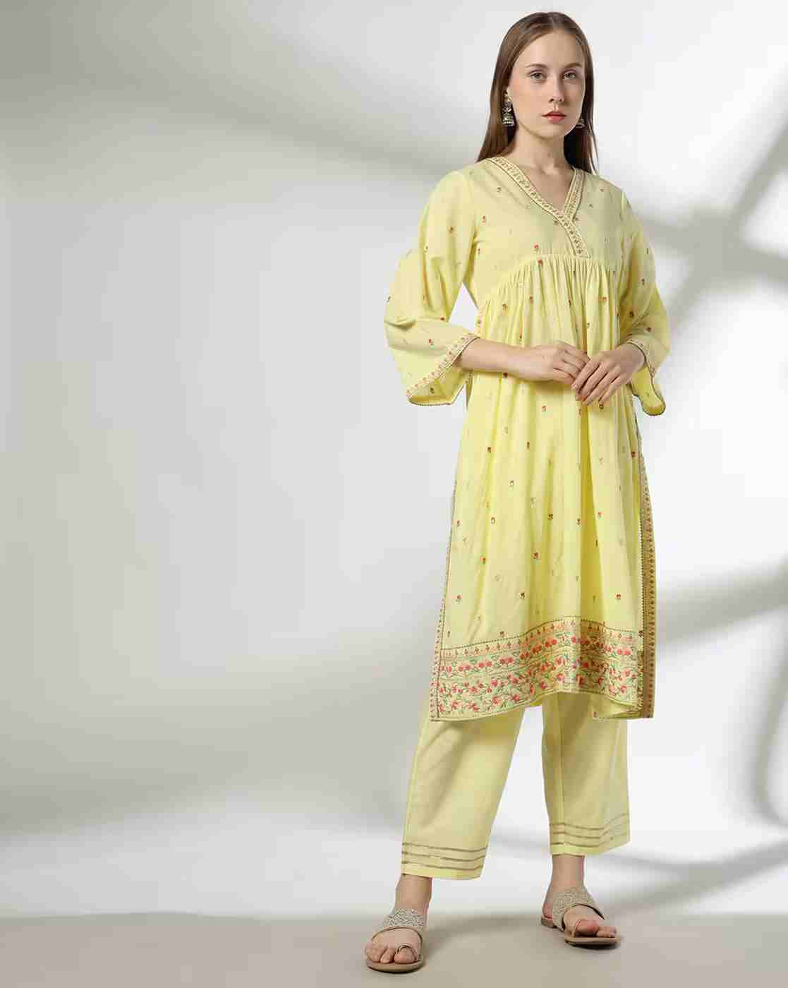 Women Embroidered Flared Kurta with Pants