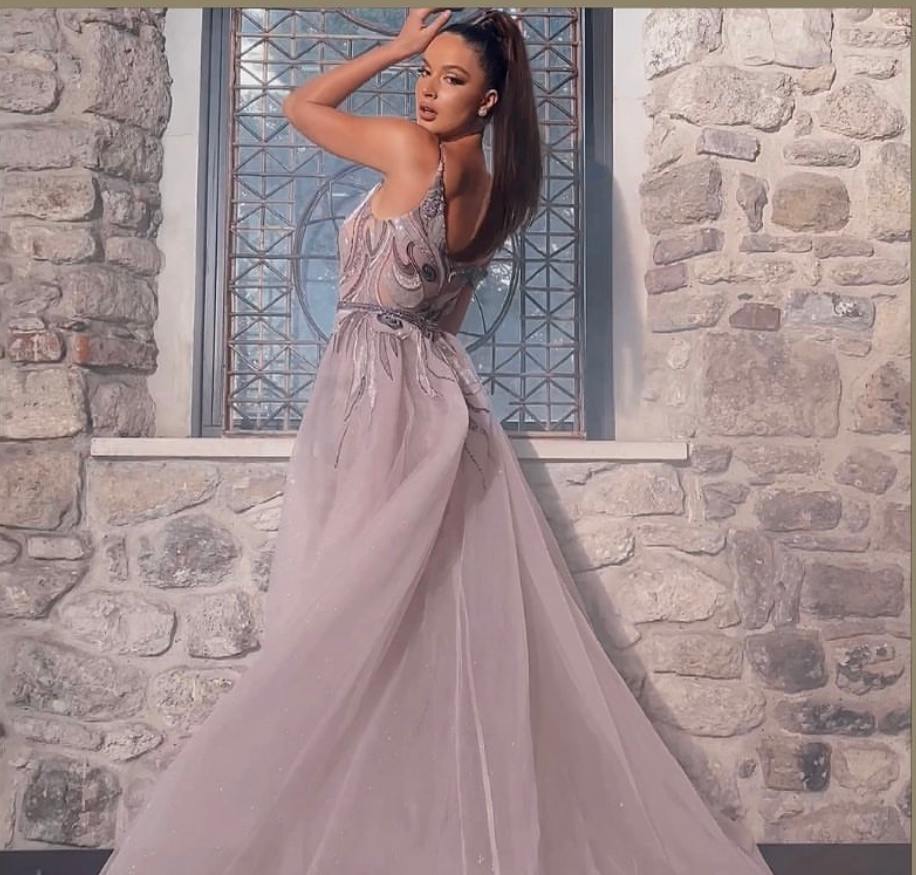 Multi off shoulder gown with overskirt