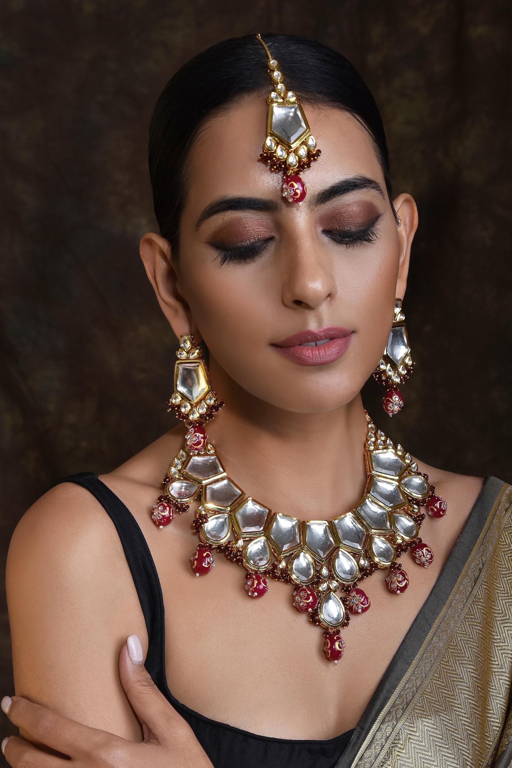 Red kundan deals bridal set