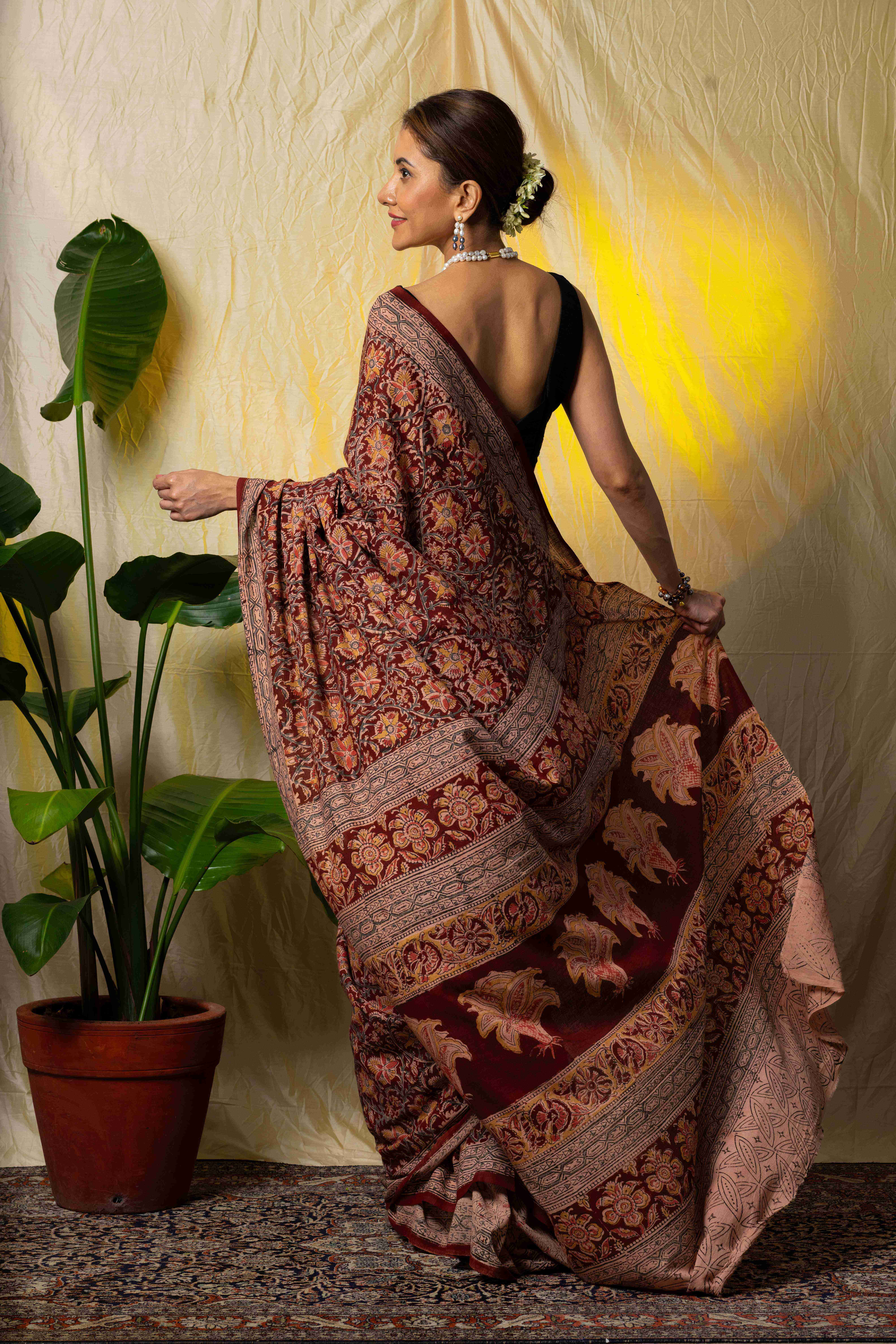 Marron handblock printed kalamkari cotton saree.