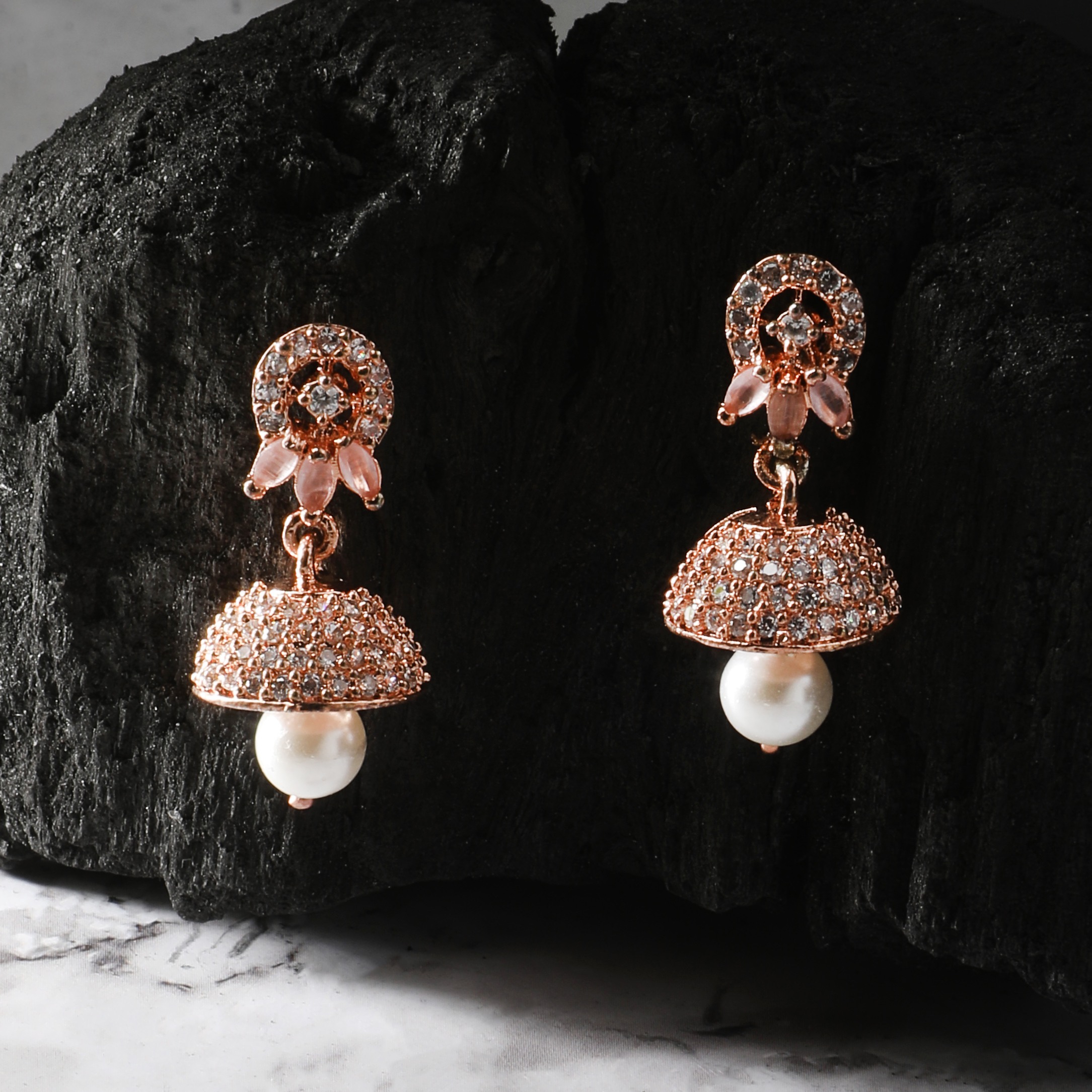 The Nila Rose Gold Pale Pink Stone Crystal Studded Jhumkas