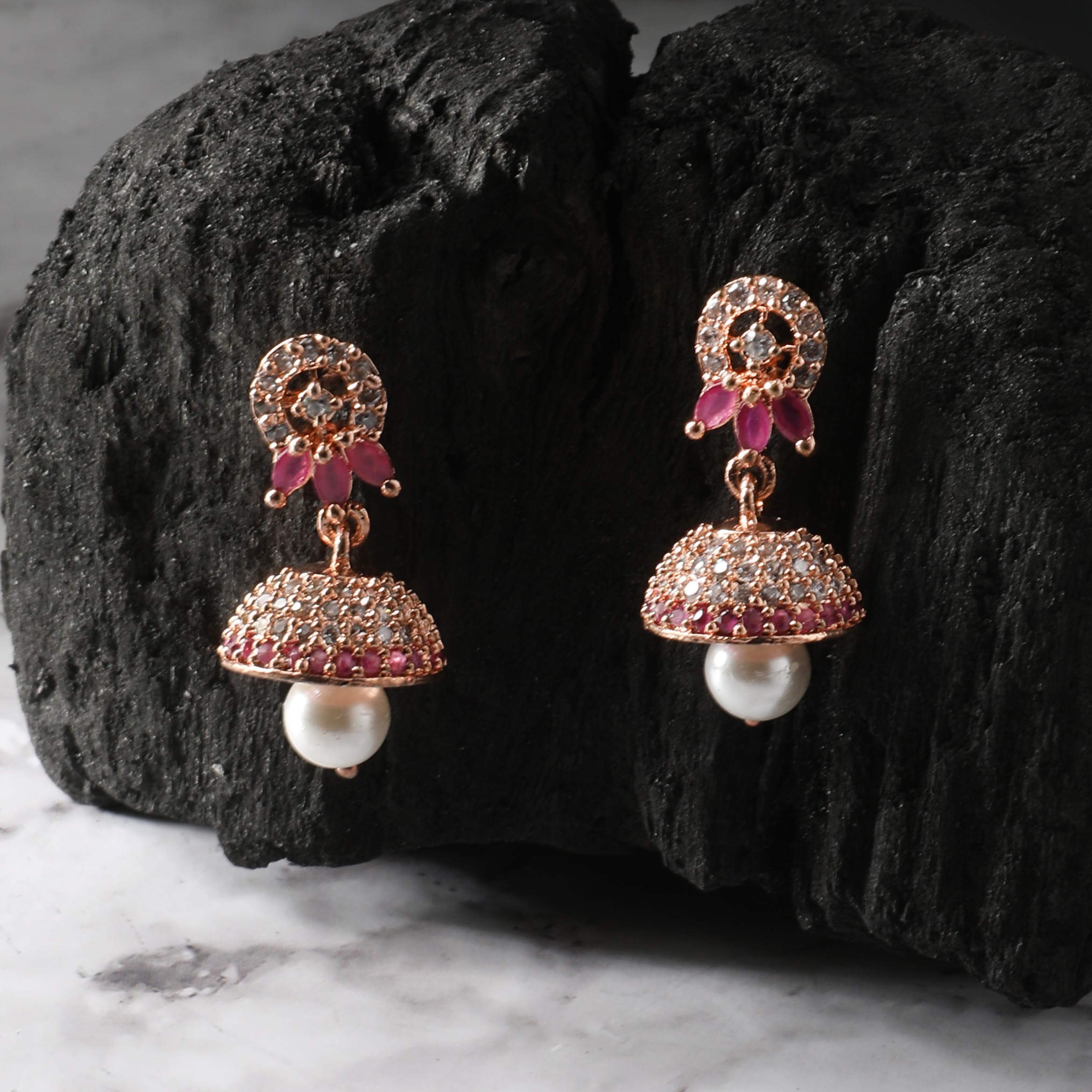 The Nila Rose Gold Pink Stone Crystal Studded Jhumkas