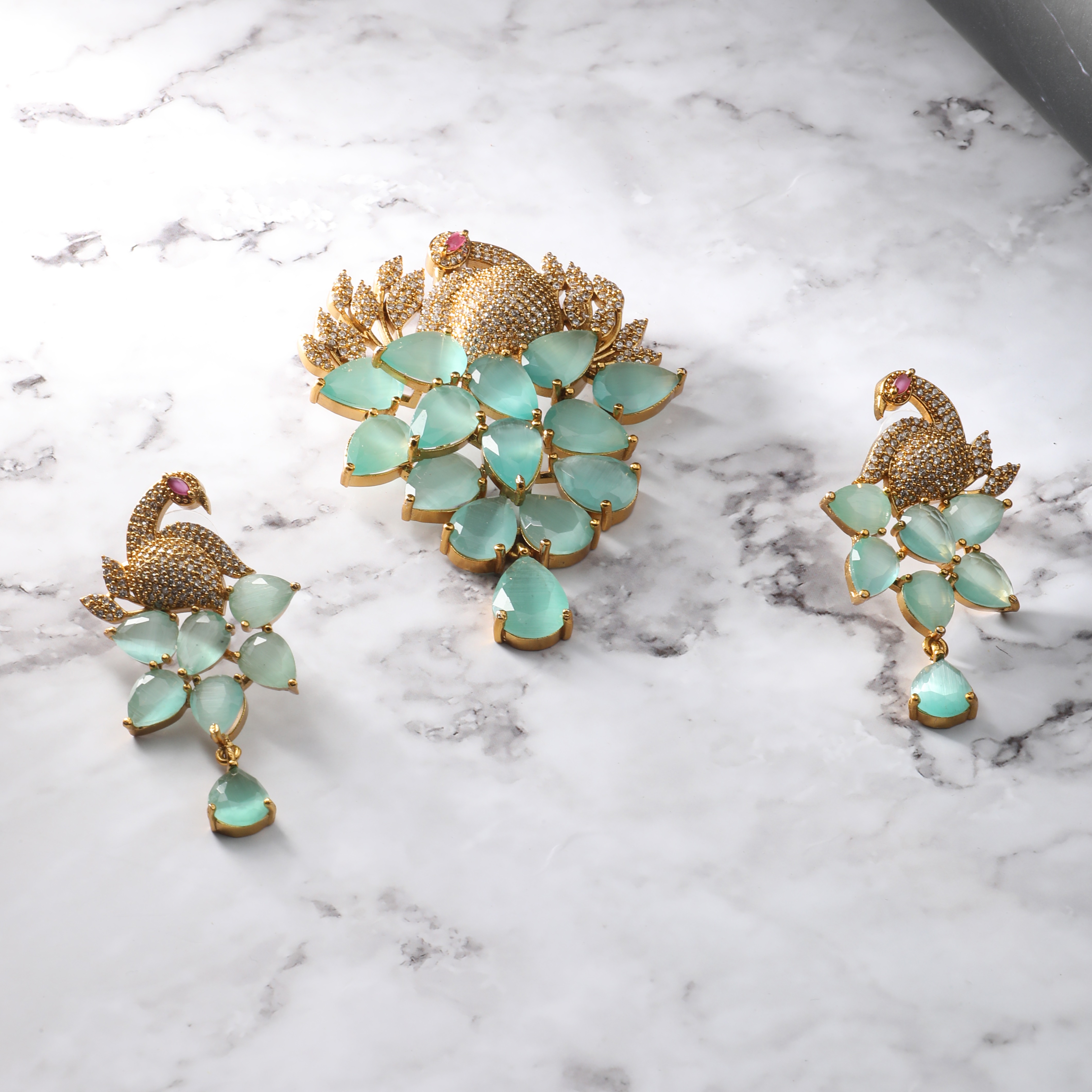 The Nila Turquoise Crystal Peacock Pendant with Earrings