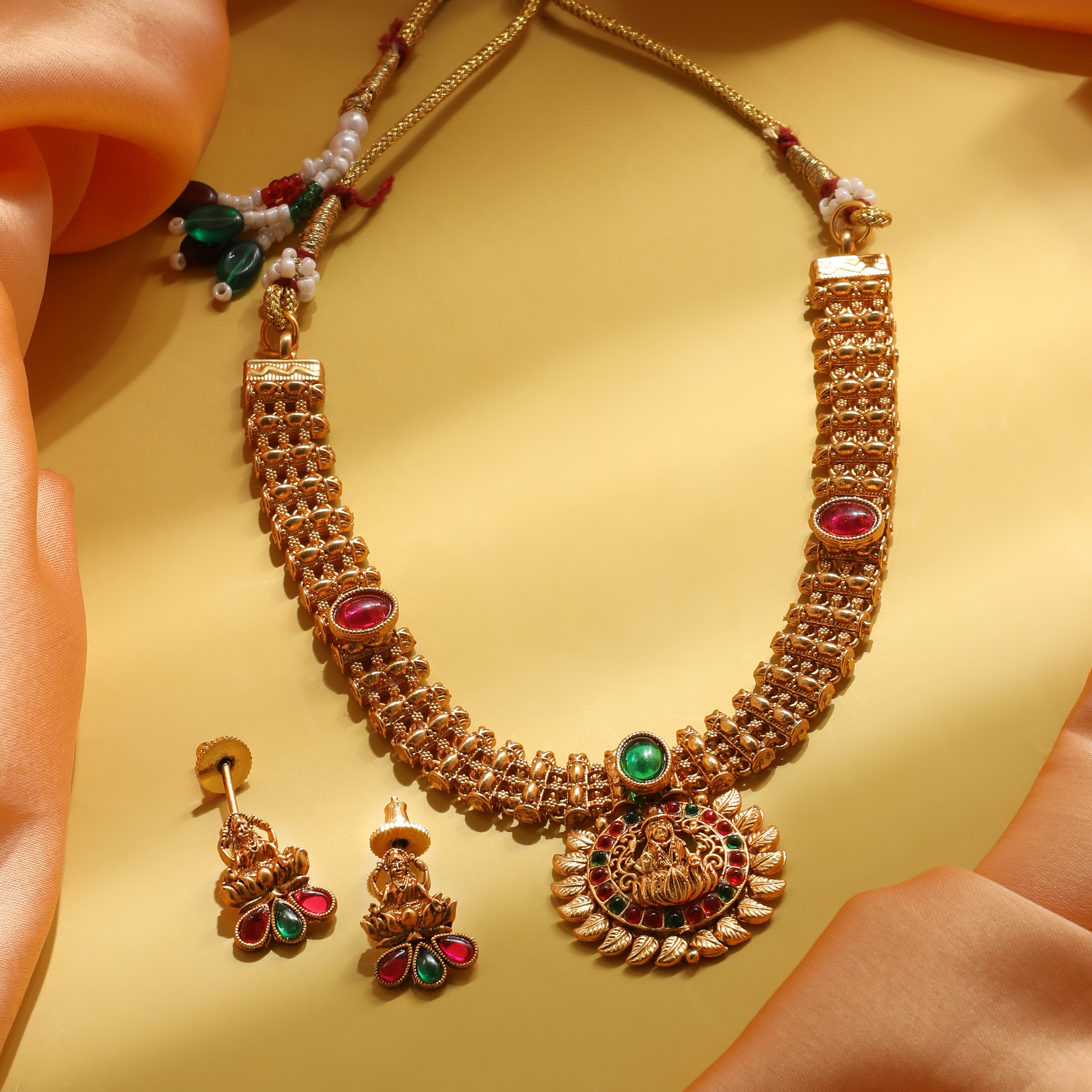 The Nila Gold Plated Lakshmi Short Necklace Set with Earings
