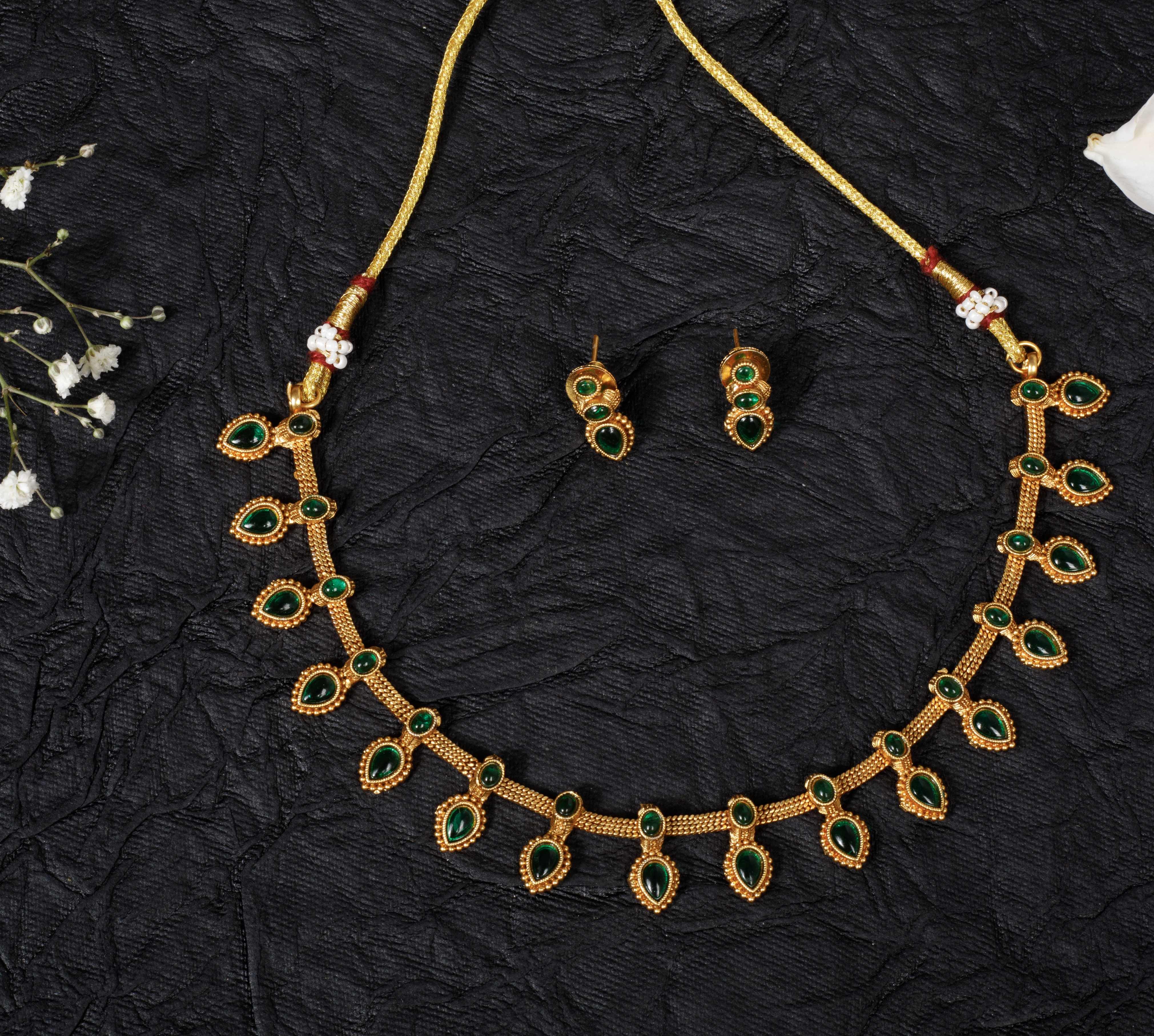 The Nila Gold Plated Ethnic Green Choker Set