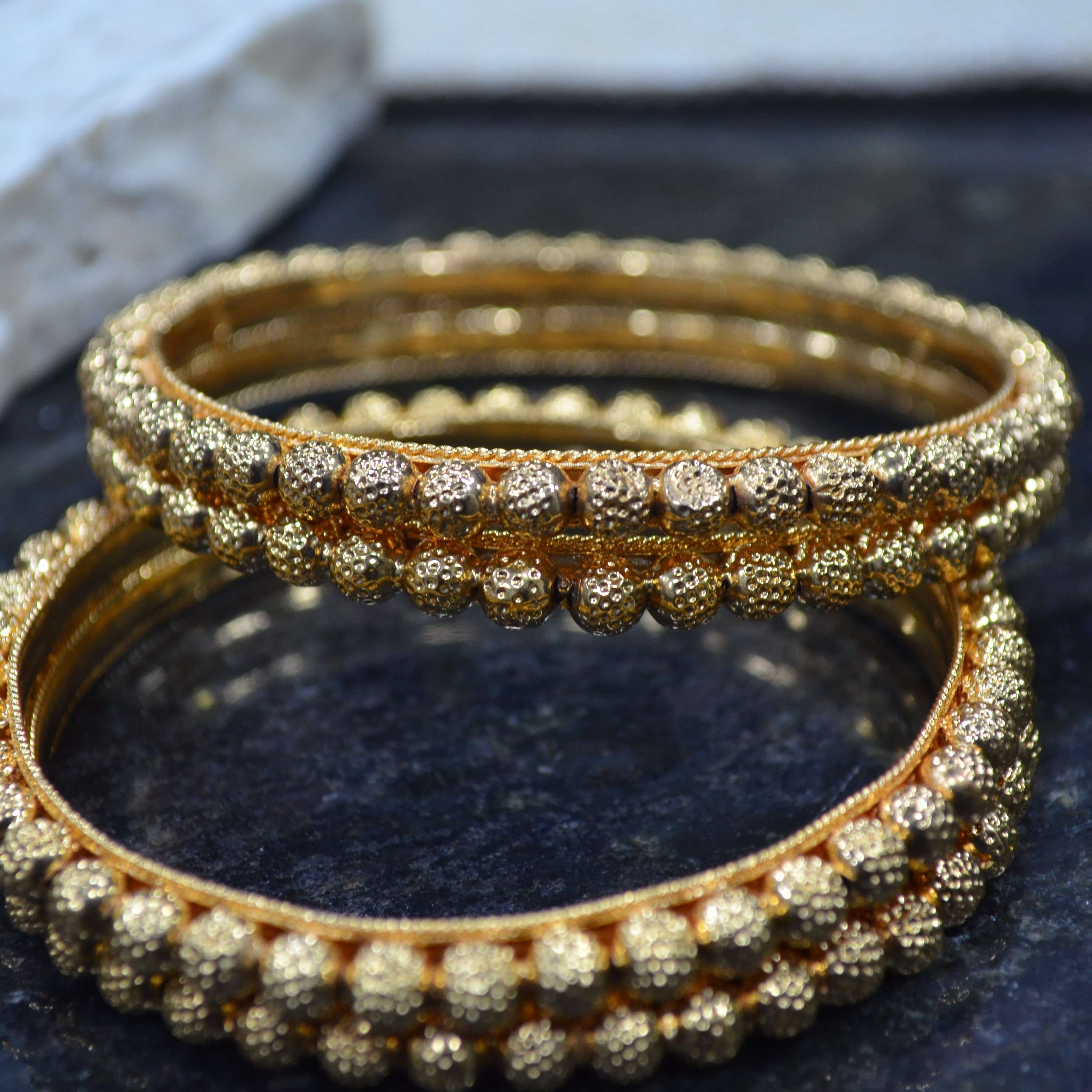 The Nila Gold Plated Beaded Temple Design Bangle Set