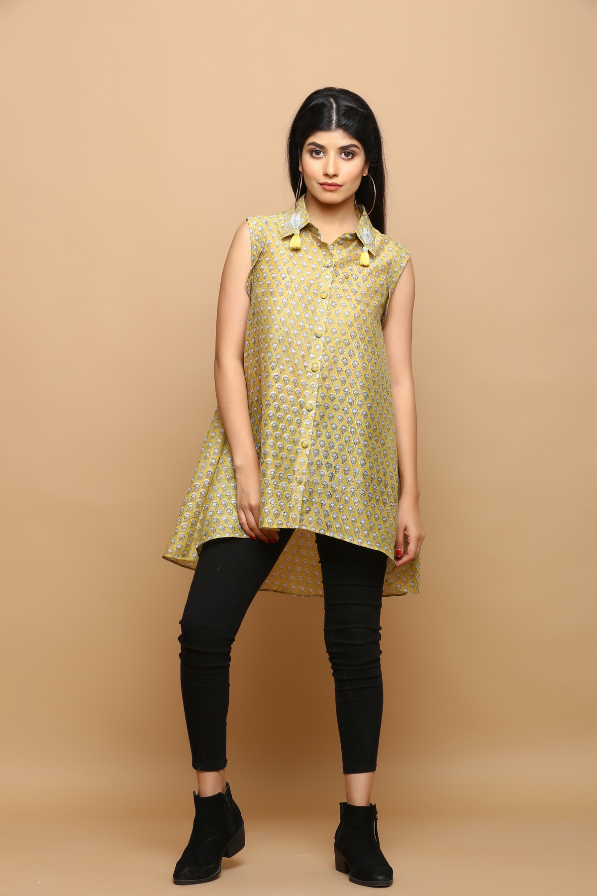 KAARAH BY KAAVYA | Chanderi a- symetrical top with hand work detailing on the collar undefined