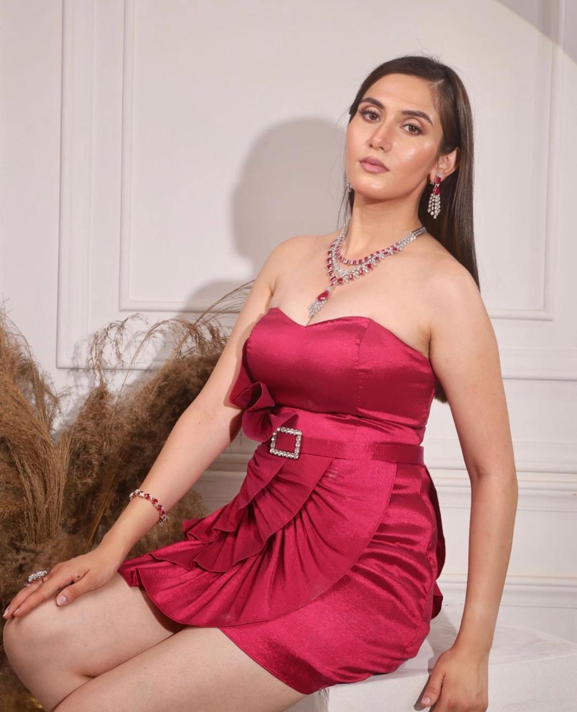 Fuchsia pink tube dress with asymmetrical frill