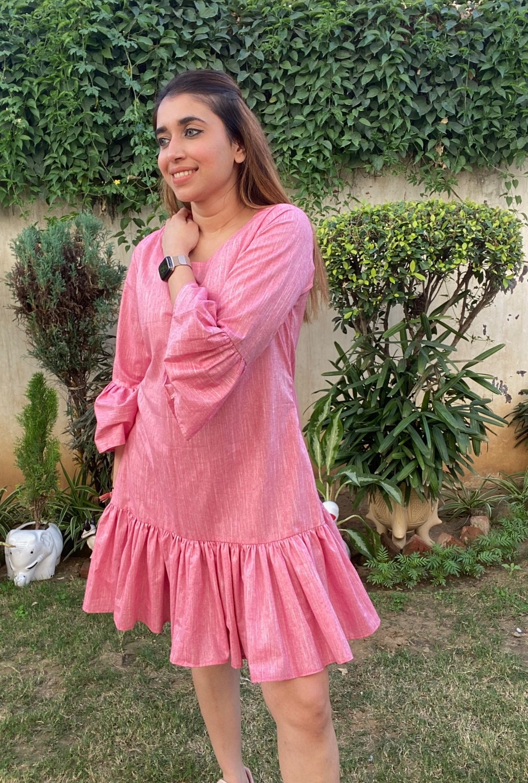 The pink monochromatic dress.