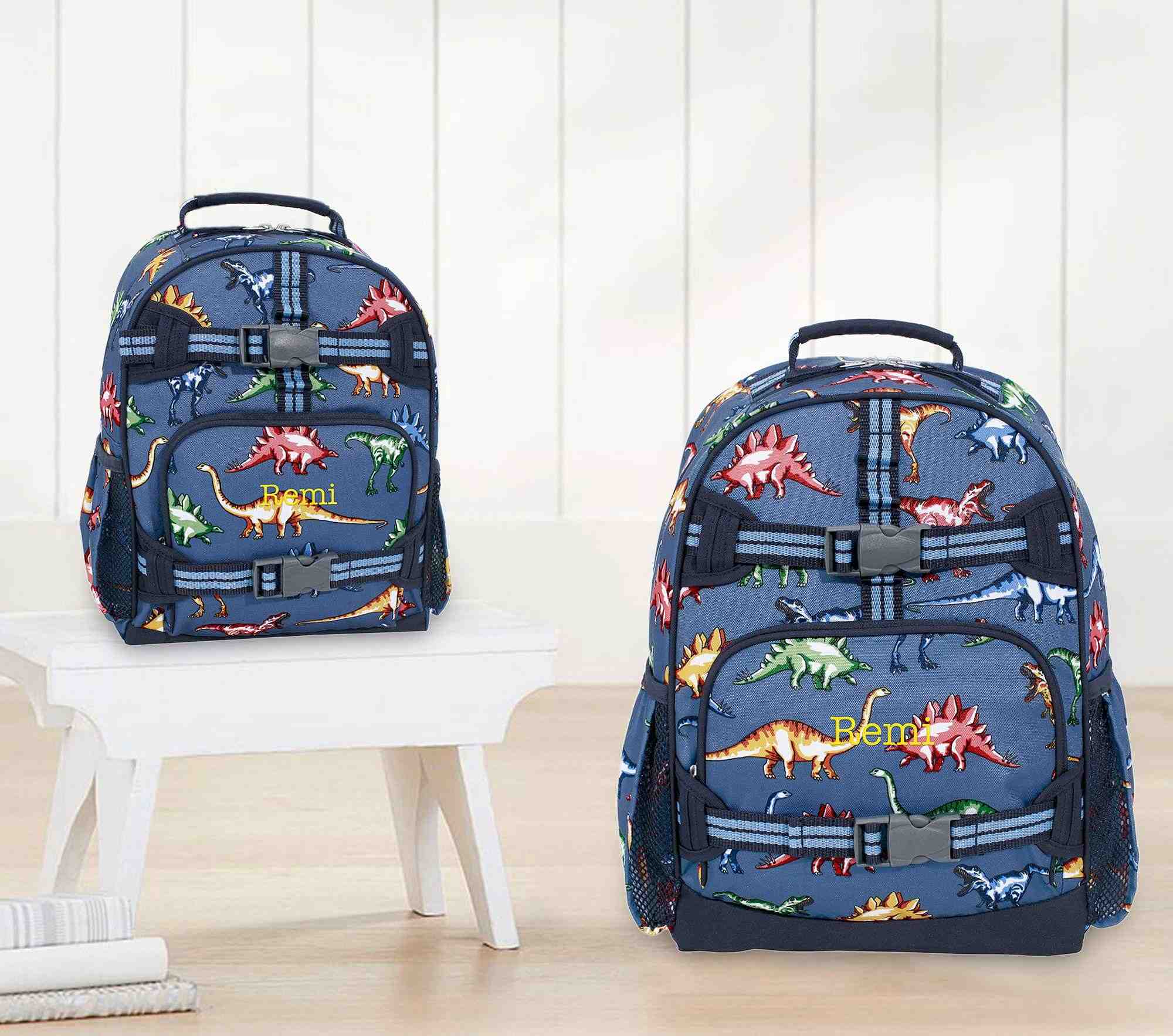 Mackenzie Blue Multi Dino Backpacks