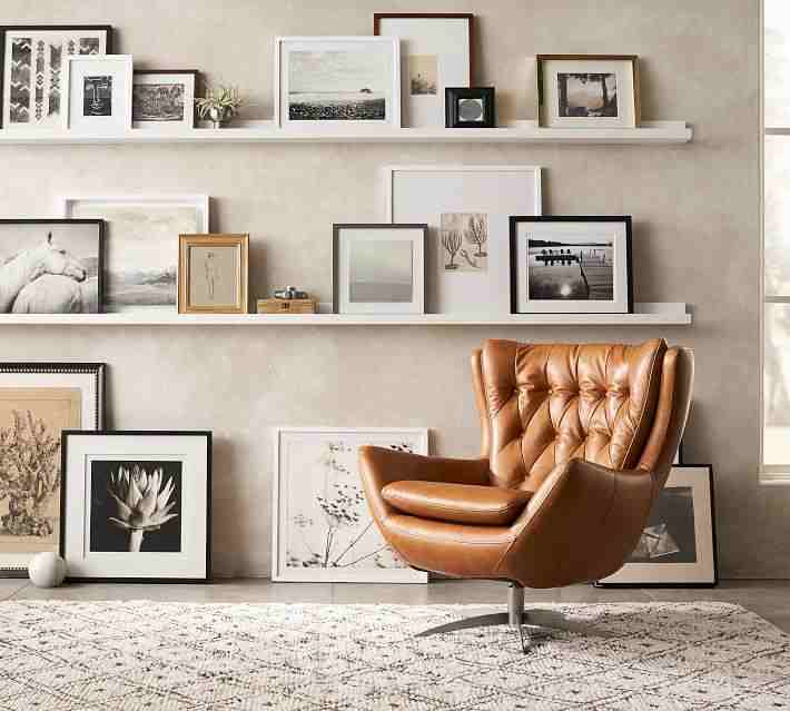 Pottery Barn | Wells Tufted Leather Swivel Armchair