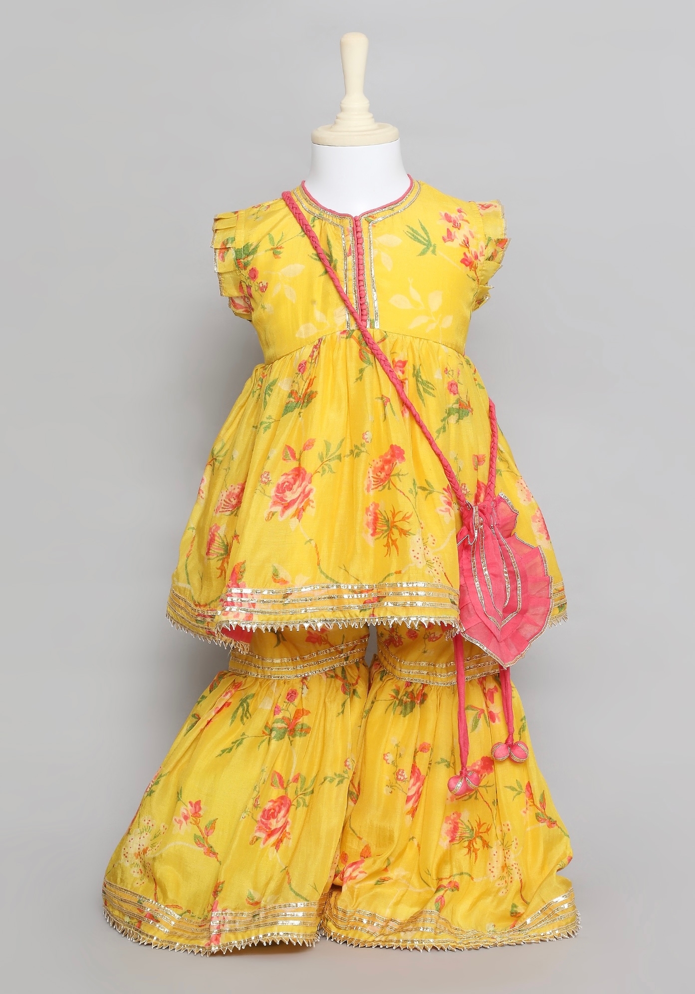 Yellow Printed Peplum Top with Gharrara and Pink Potli Bag