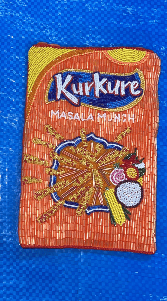 Orange Kurkure bag