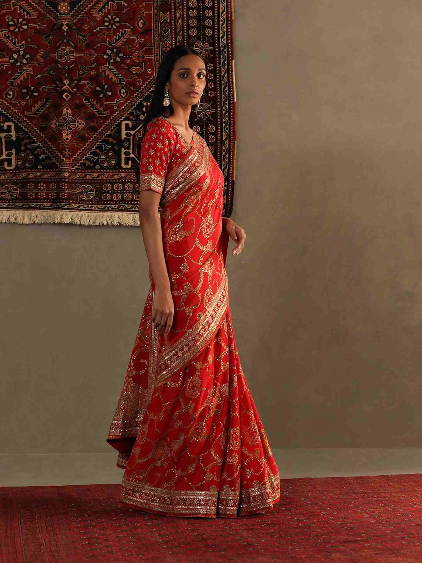 Red Rukmini Saree With Unstitched Blouse