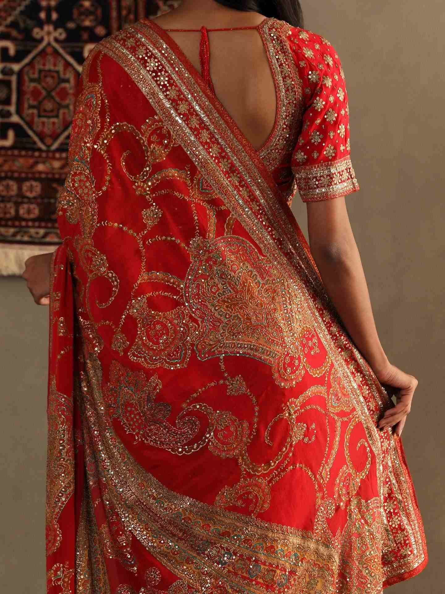 Red Rukmini Saree With Unstitched Blouse