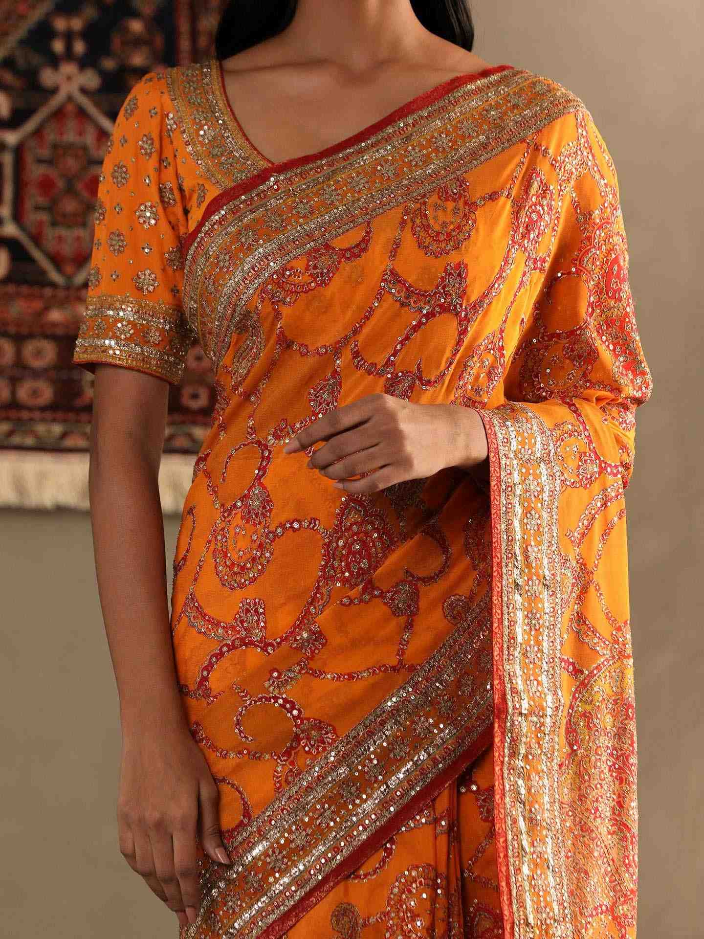 Orange Rukmini Saree With Unstitched Blouse