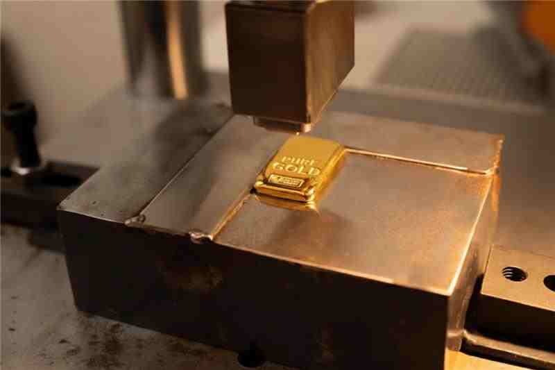 Molten metal being poured in refining process