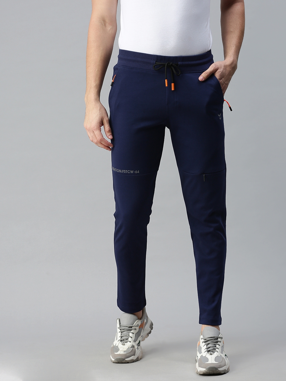 Buy FITINC Light Grey Slim Fit Joggers for Men with Double Piping & Zip  Pockets Online at Best Prices in India - JioMart.
