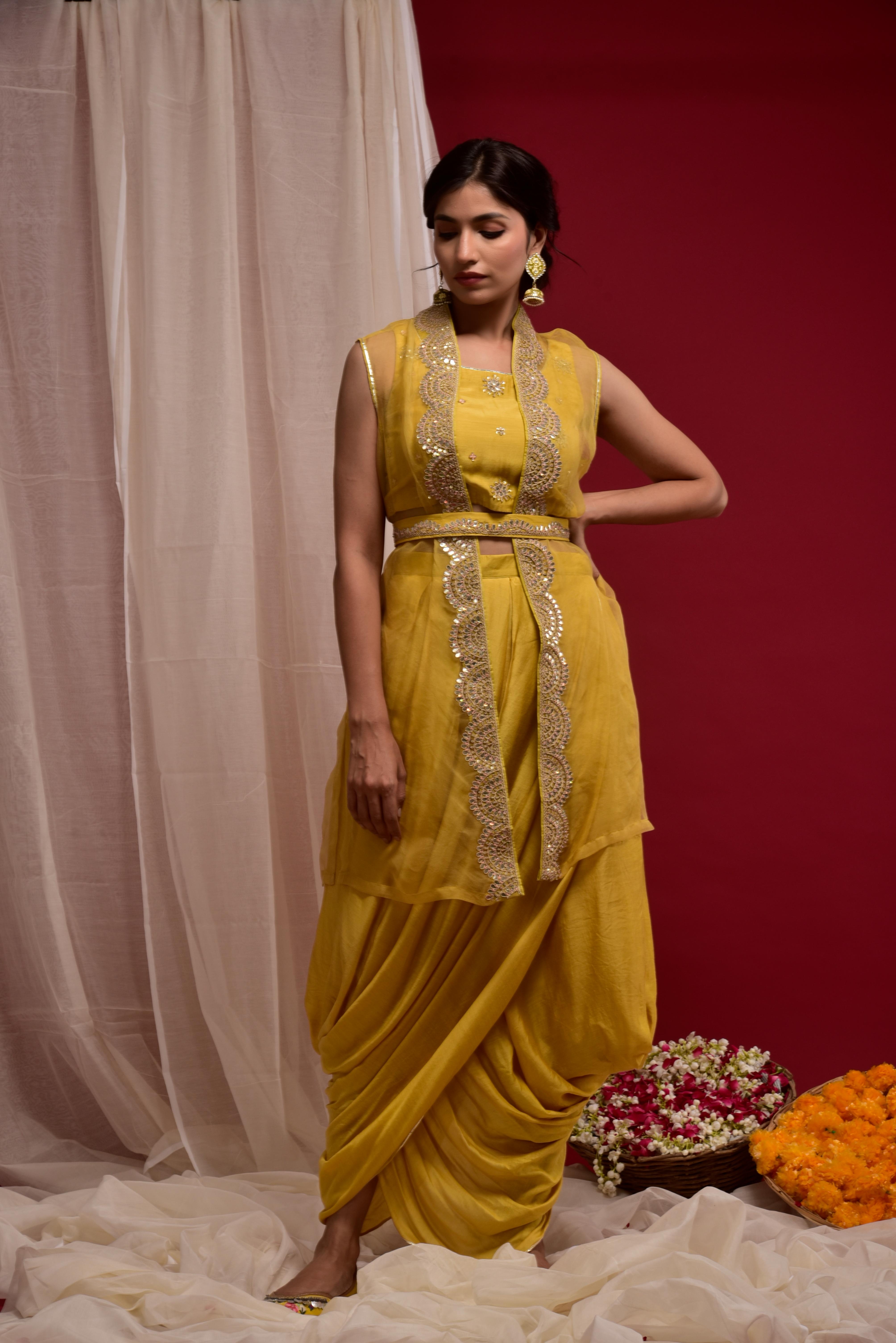 KAARAH BY KAAVYA | Mustard crop top with a cowl skirt and organza jacket with gota work undefined