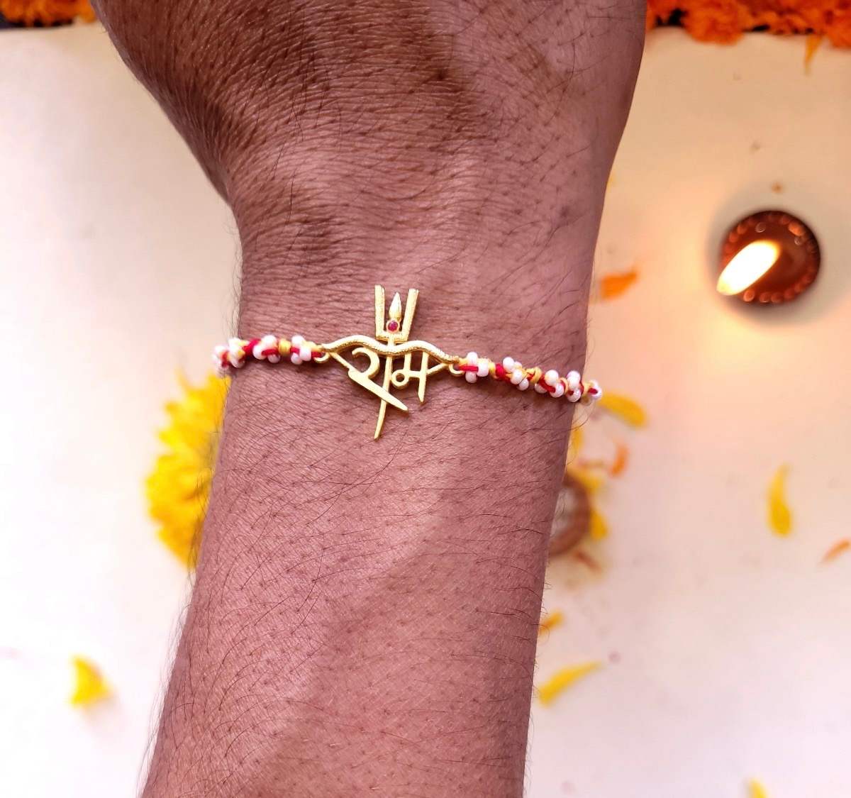 Ram Rakhi in 18k plated gold