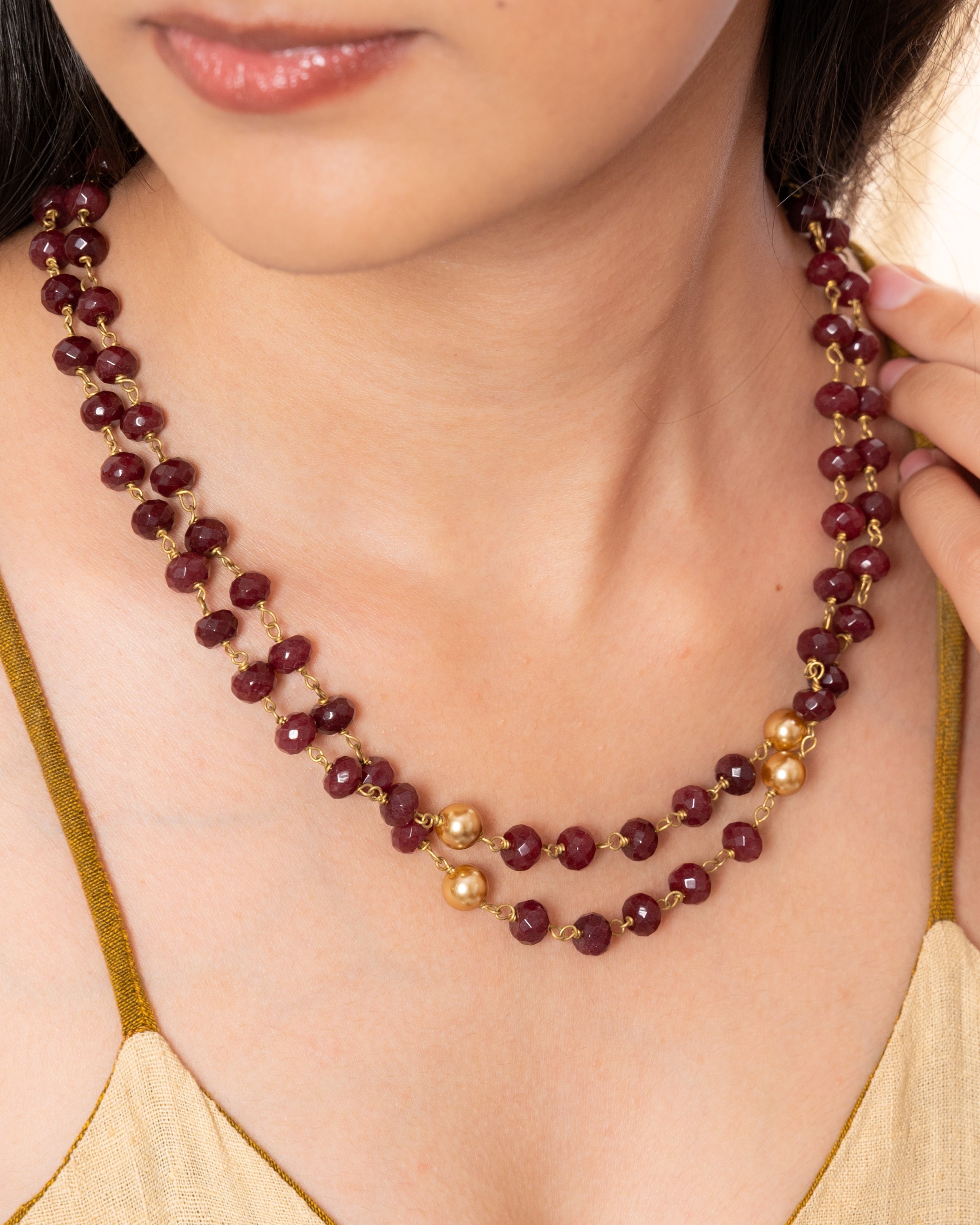 Double layered burgundy and golden shade pearl beads necklace