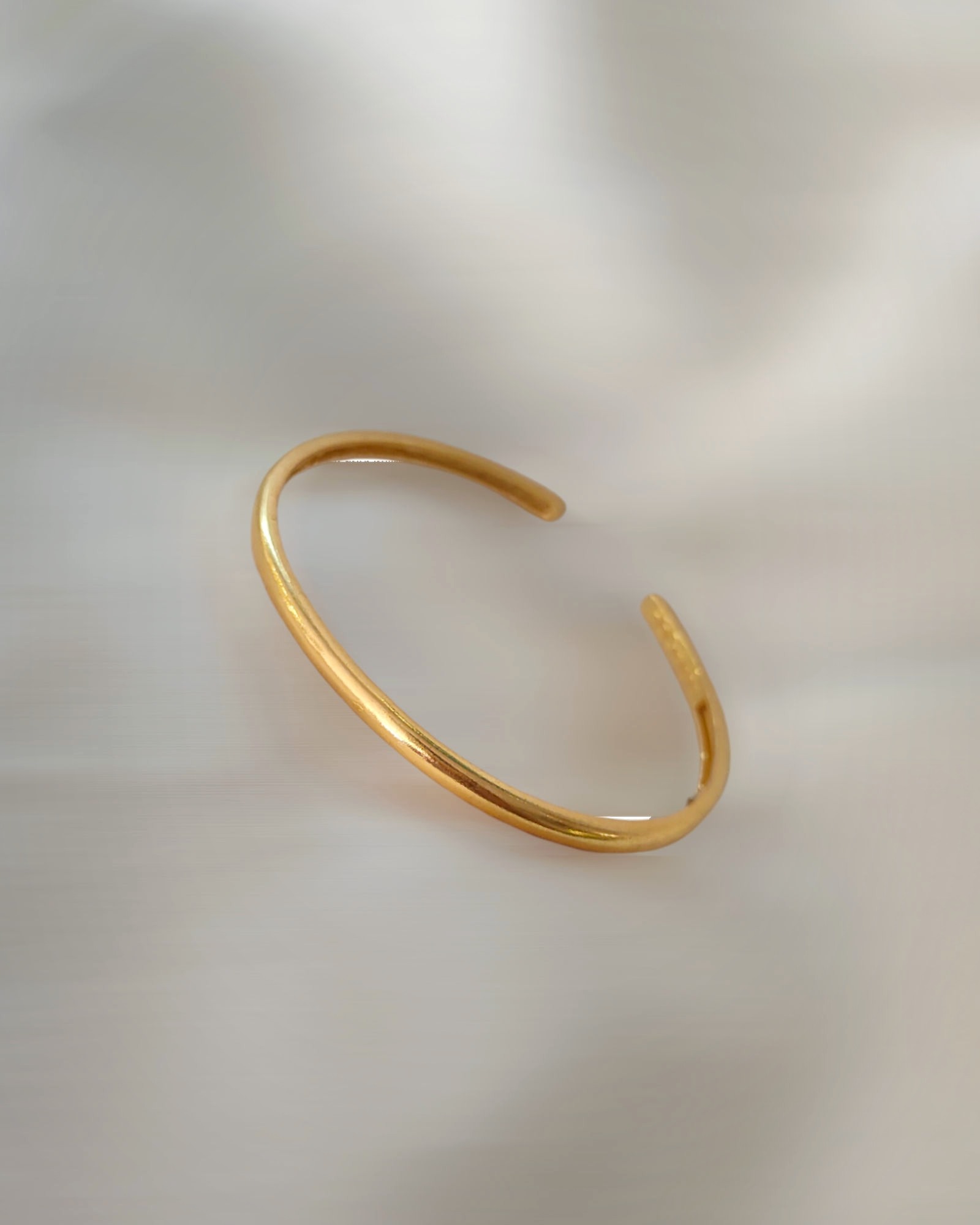 Thin metal bangle