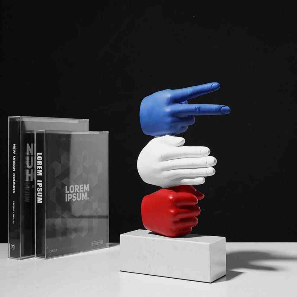 rock paper scissor sculpture