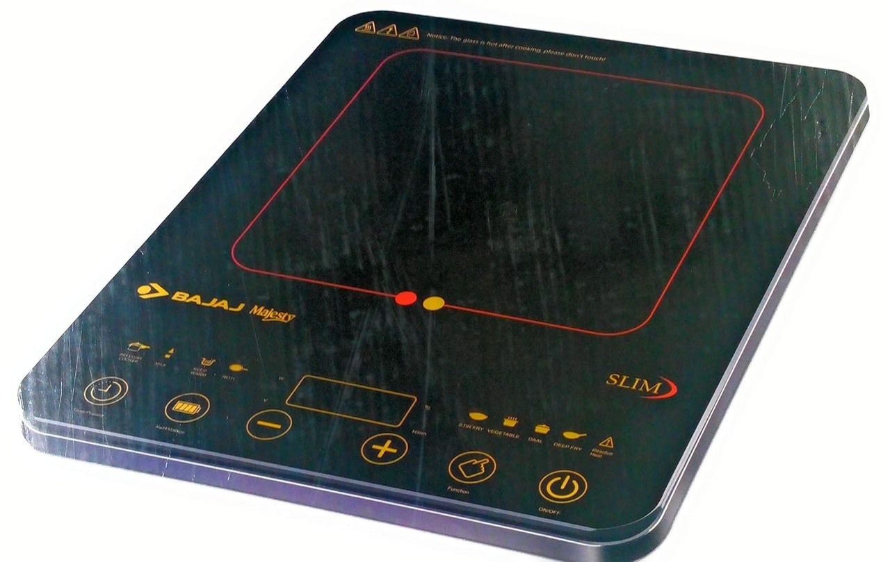 Bajaj ABS Majesty Slim 2100-Watt Induction Cooktop - 8 Auto Cook Indian Menu, Feather Touch Controls, Pre-set Timer, 1 Yr Warranty - Black
