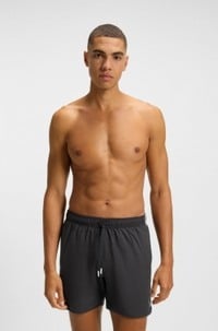 Swim shorts with signature stripe and logo