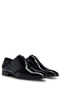 Patent leather Oxford shoes with a pointed shape