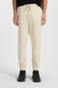 Stretch-cotton tracksuit bottoms with logo print