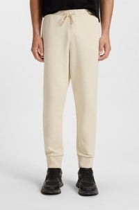 Stretch-cotton tracksuit bottoms with logo print