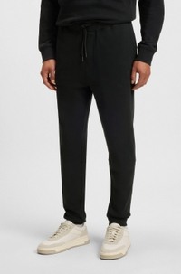 Cotton-terry tracksuit bottoms with logo patch