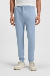 Cotton-terry tracksuit bottoms with logo patch