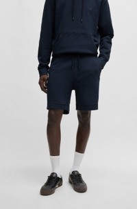 Relaxed-fit shorts in cotton terry with logo badge