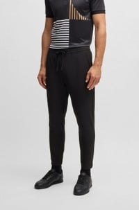 Tapered-fit trousers in water-repellent stretch fabric