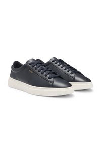 Lace-up trainers in polished leather with logo details