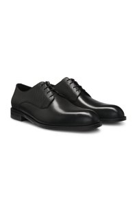 Derby shoes in printed and smooth leather