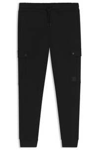 Relaxed-fit cotton-terry tracksuit bottoms with cargo pockets