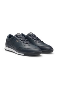 Leather trainers with gold-tone logo