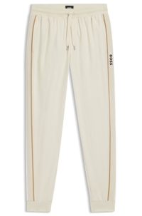 Cotton-terry tracksuit bottoms with tape and logo