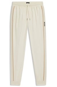 Cotton-terry tracksuit bottoms with tape and logo